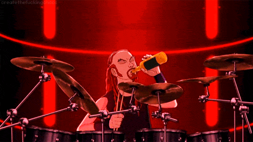 Pickles the Drummer Drinking a Bottle of Beer While Sitting Behind His Drum Kit